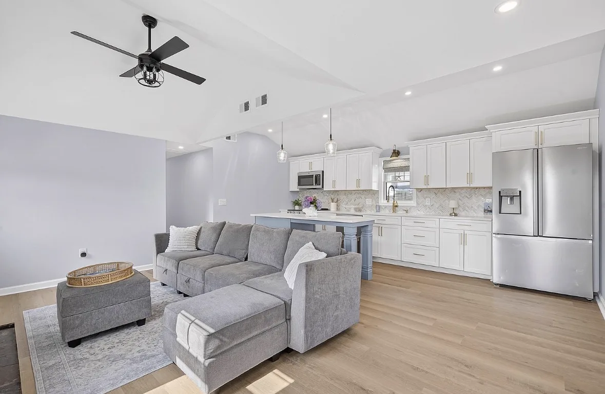 Open living room and kitchen with vaulted ceilings