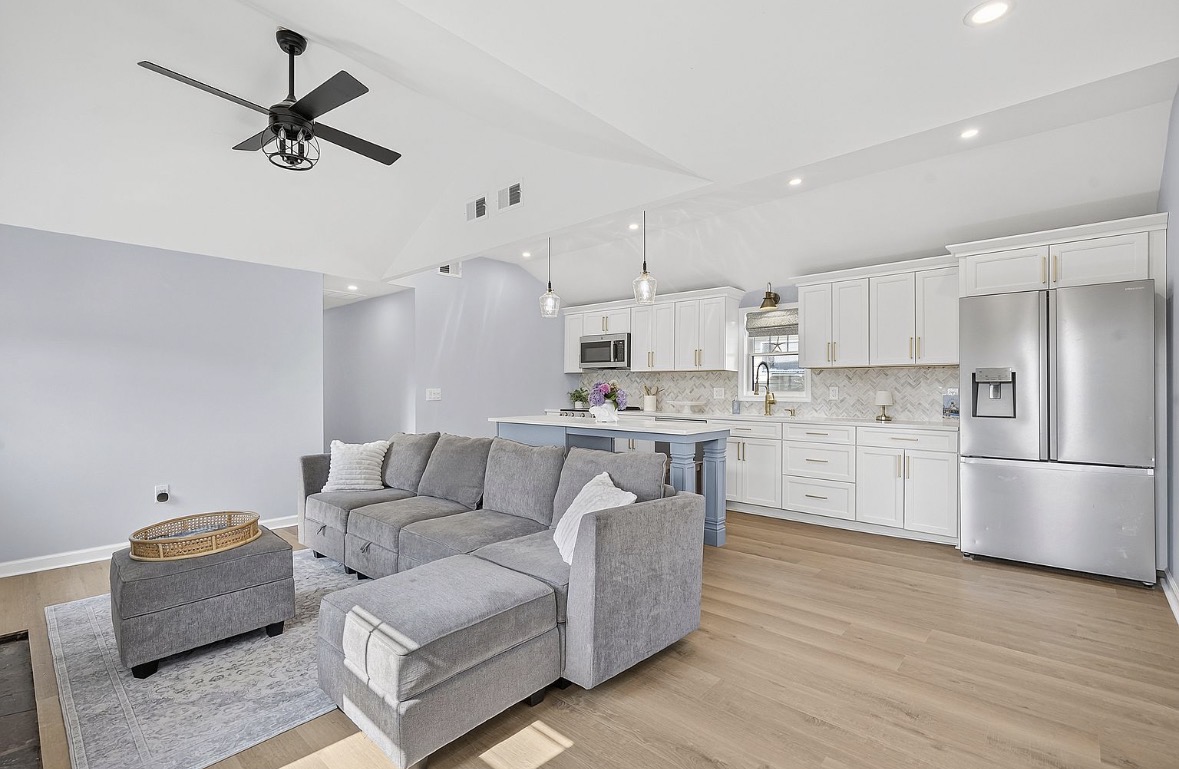Open living room and kitchen with vaulted ceilings